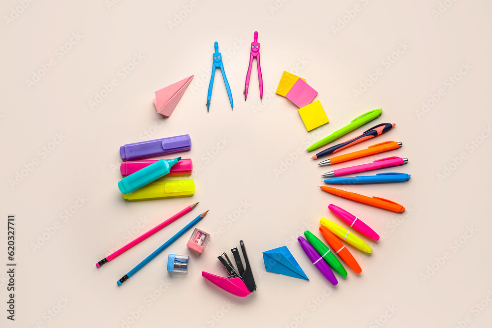 Frame of colorful stationery on light background