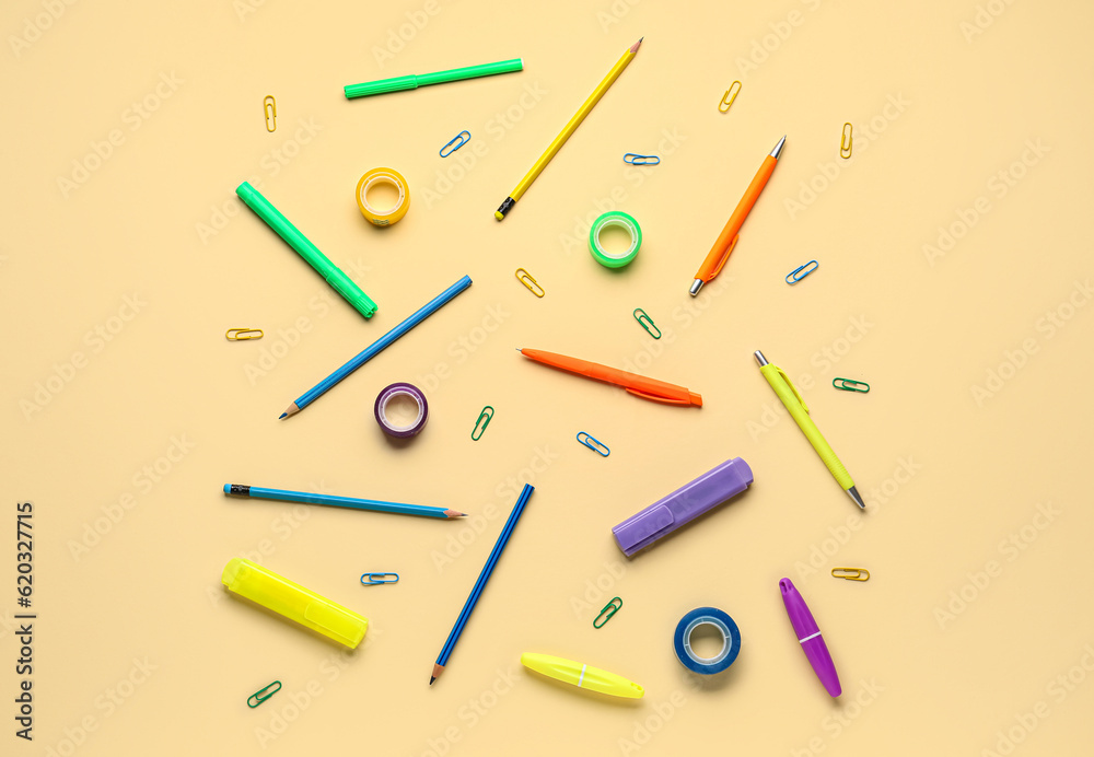 Composition with different stationery on color background