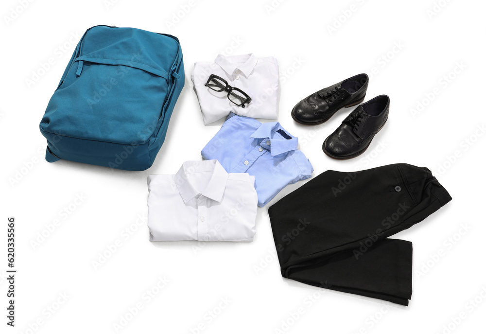 Composition with stylish school uniform, backpack, eyeglasses and shoes on white background