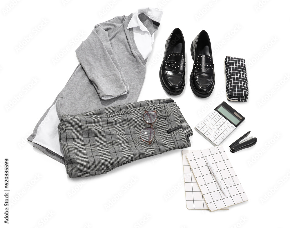 Composition with stylish school uniform, shoes and stationery on white background