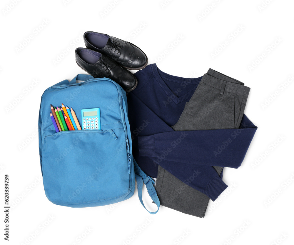 Stylish school uniform with backpack, calculator and pencils isolated on white background