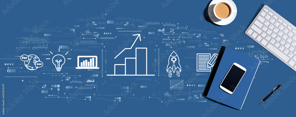 Business growth analysis with a computer keyboard and office items