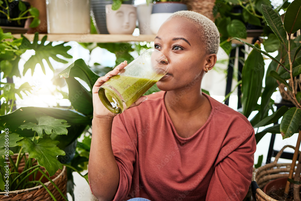 Healthy, black woman and drinking a green smoothie for nutrition with vegetables for supplement. Gir