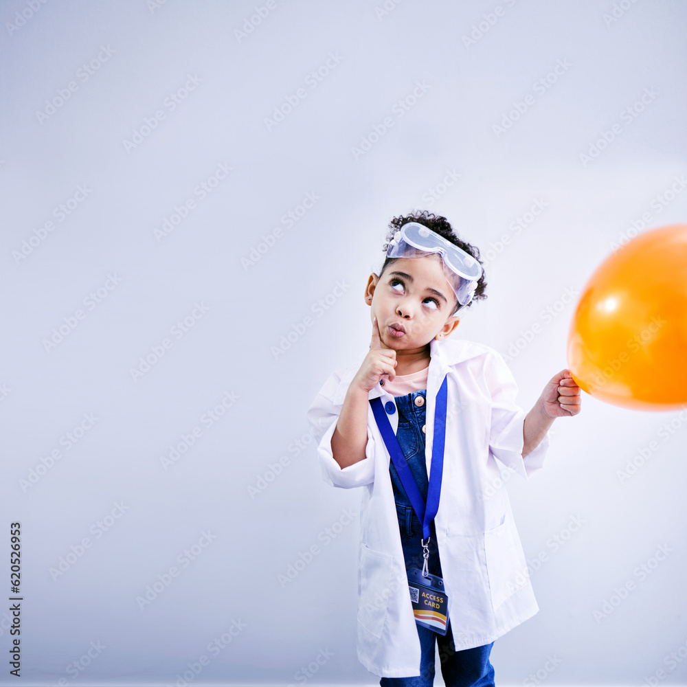 Child, thinking and balloon science in studio with .hand on chin, goggles and idea. African kid stud