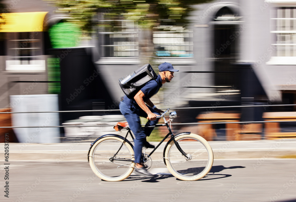 Delivery man, bicycle and motion blur in city for fast logistics, quick distribution service and ord