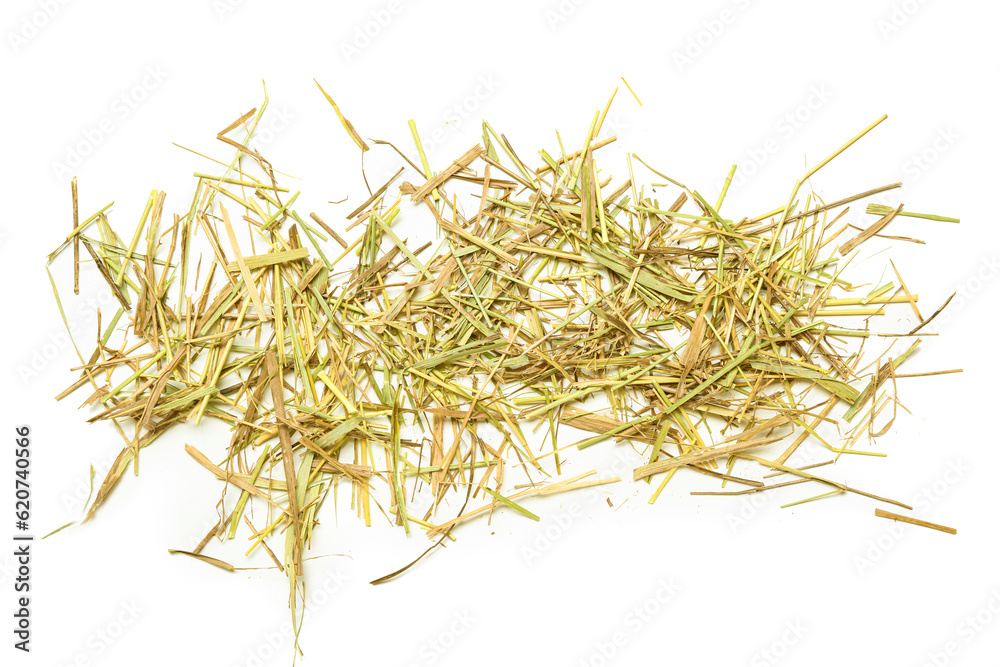 Straw scattered on white background