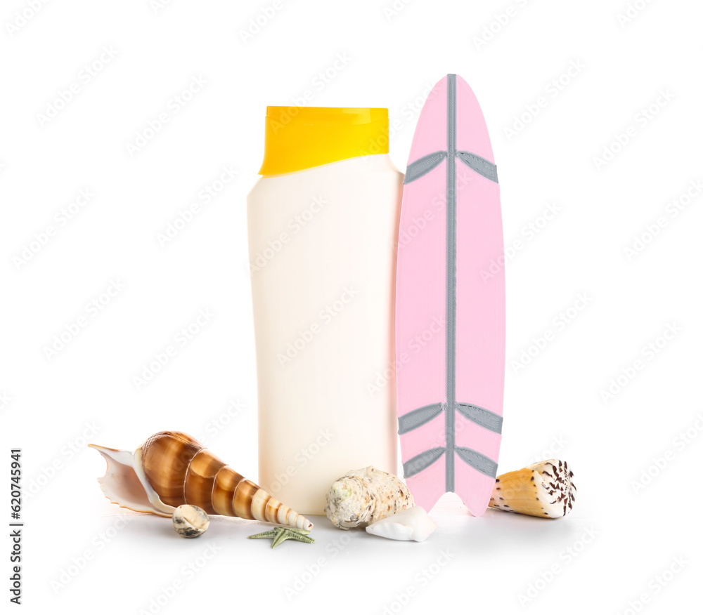 Mini surfboard with bottle of sunscreen cream and seashells isolated on white background