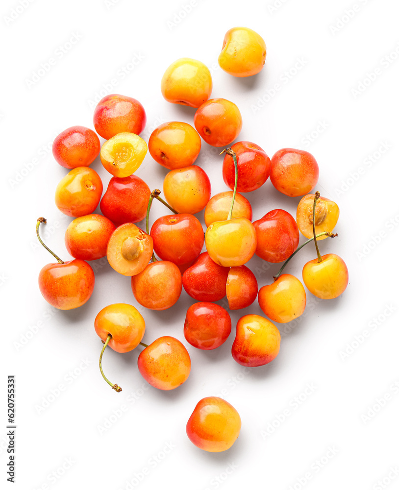 Many sweet yellow cherries on white background