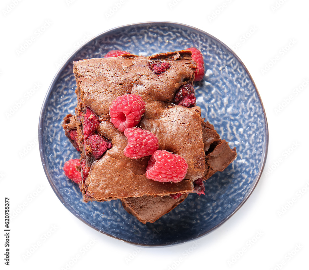 Plate with pieces of raspberry chocolate brownie on white background