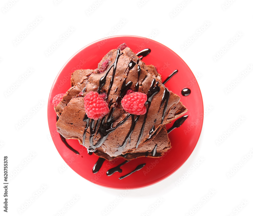 Plate with pieces of raspberry chocolate brownie on white background