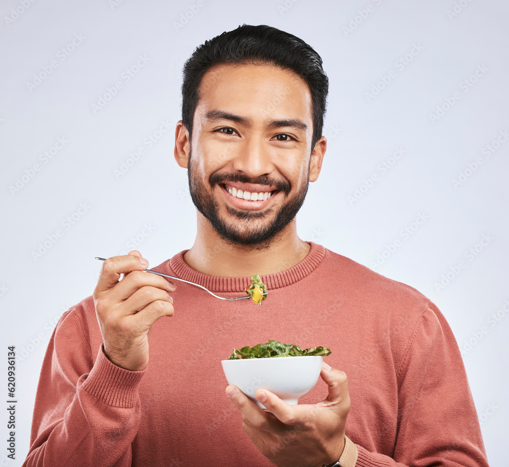 Fruit, portrait and happy asian man in studio for health, wellness and detox on grey background. Bre