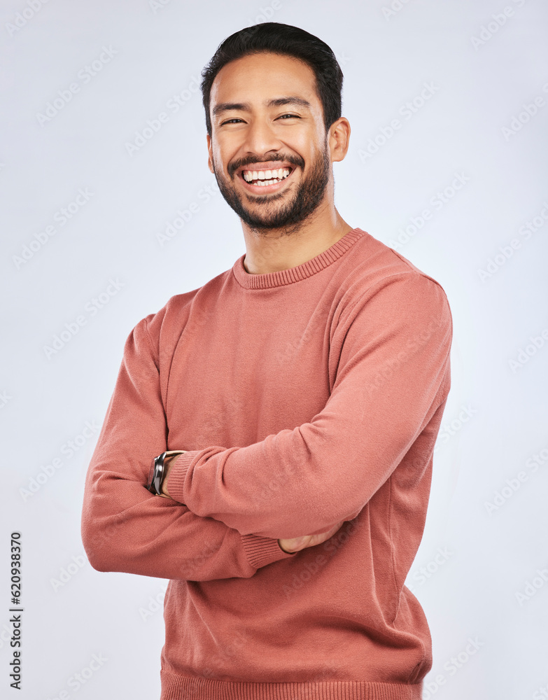 Portrait, happy or Asian man laughing with arms crossed or smile in studio in casual fashion or clot