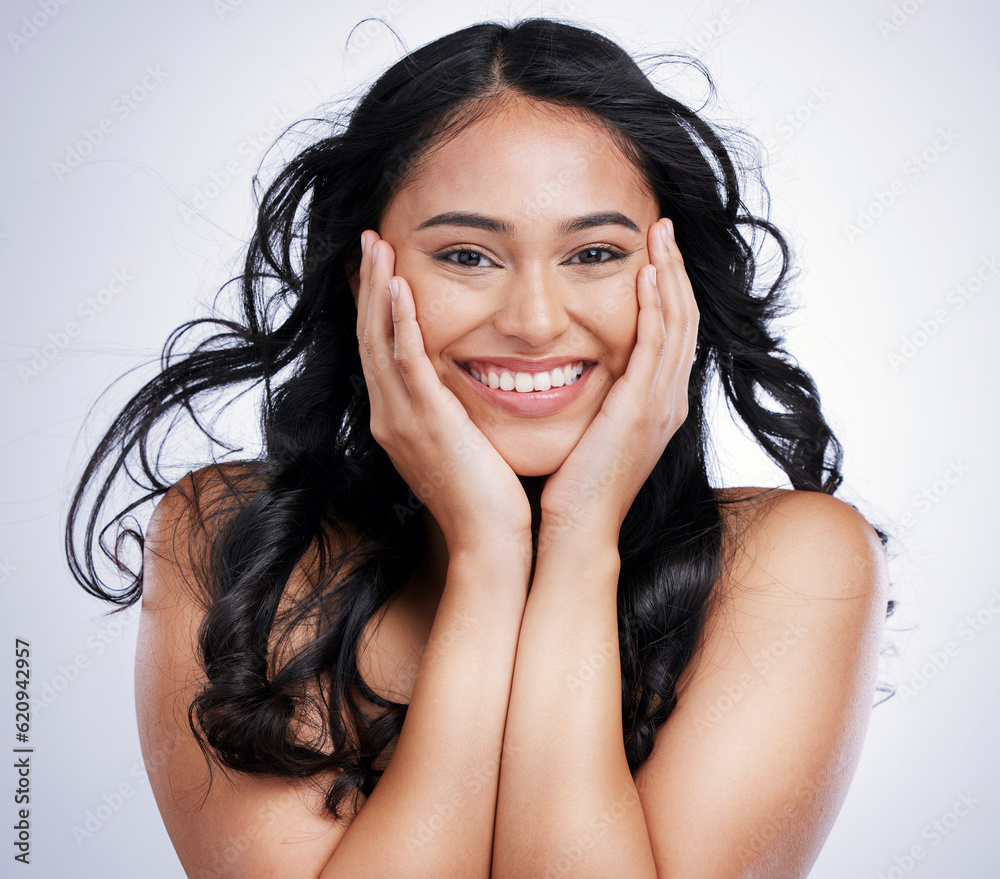 Hair, portrait and Indian woman in studio for beauty, wellness and styling on grey background. Happy