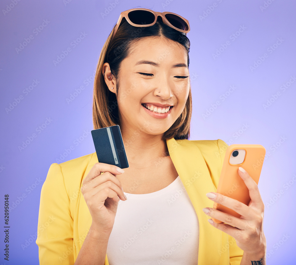 Woman, phone and credit card of e commerce, online shopping or fintech payment on studio purple back