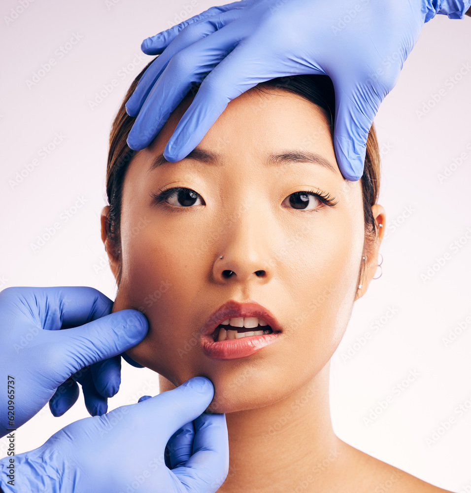 Asian woman, surgery and pinch facial skin in studio for cosmetic, inspection and hands in gloves by