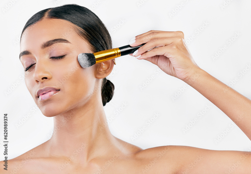 Facial, skincare and woman with makeup, brush and dermatology against a white studio background. Bea