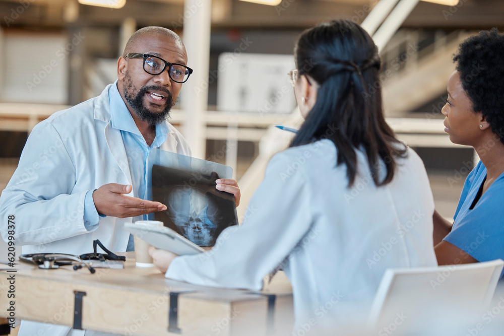 Black man, doctors and meeting with xray in clinic for test results, research or healthcare review. 