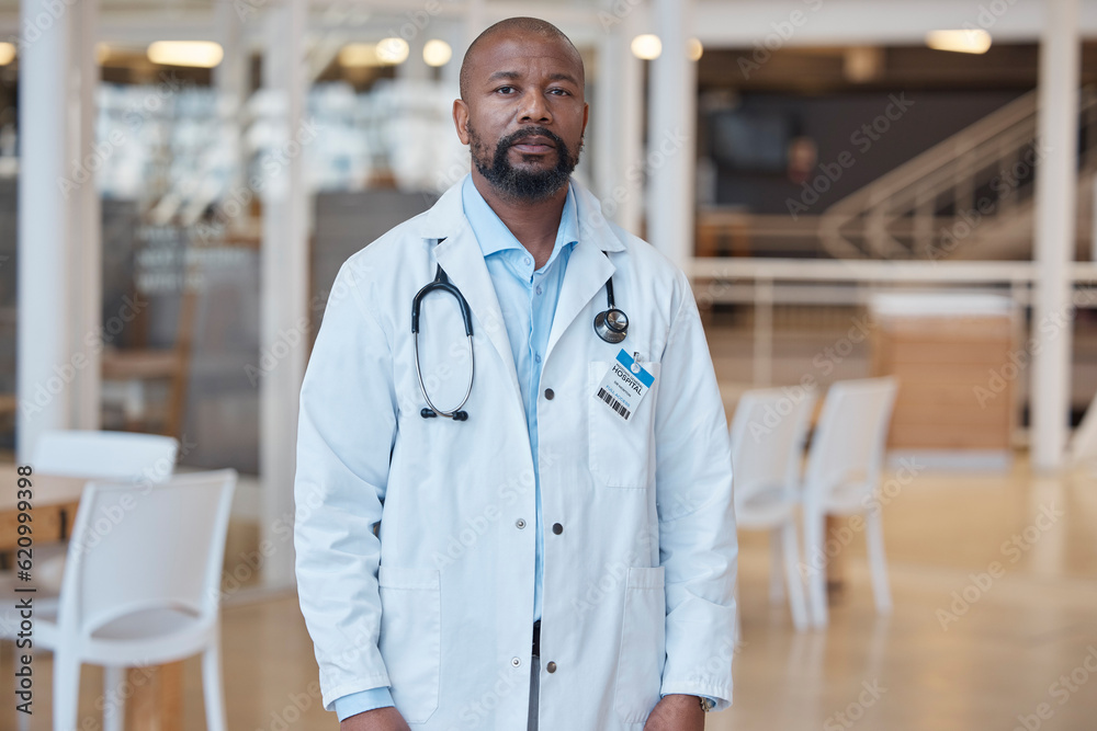 Portrait, black man and serious doctor in hospital for healthcare. African medical professional, fac