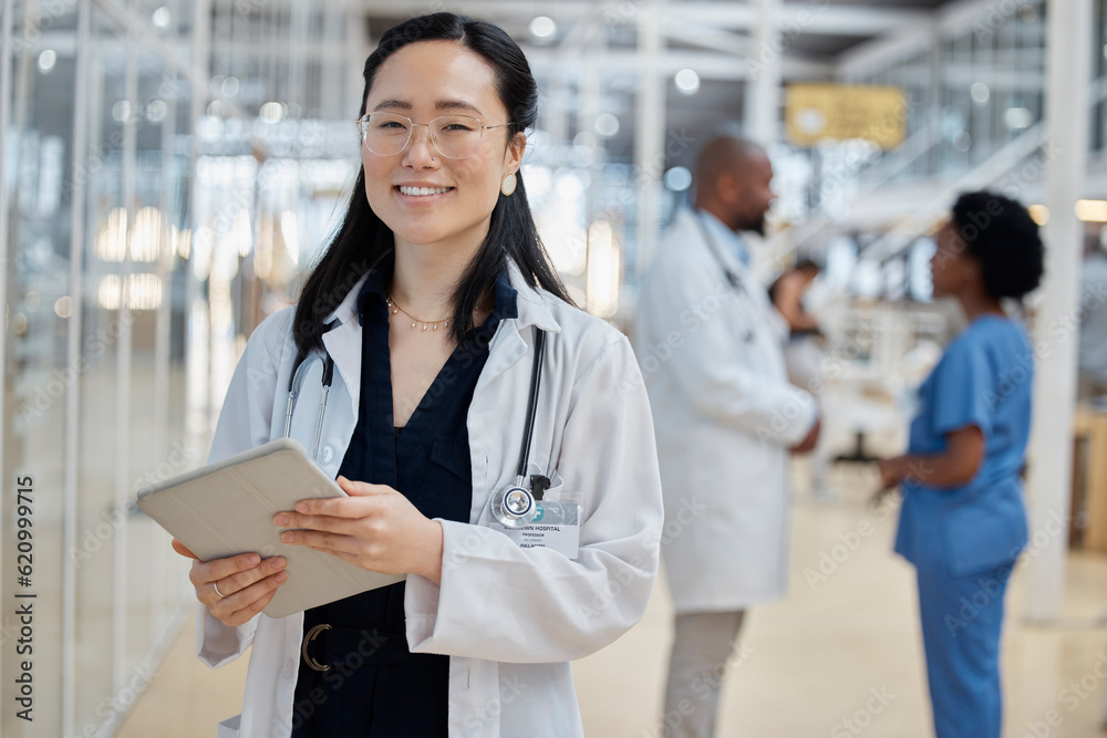 Asian woman, doctor with tablet and portrait smile in hospital for healthcare, telehealth and resear