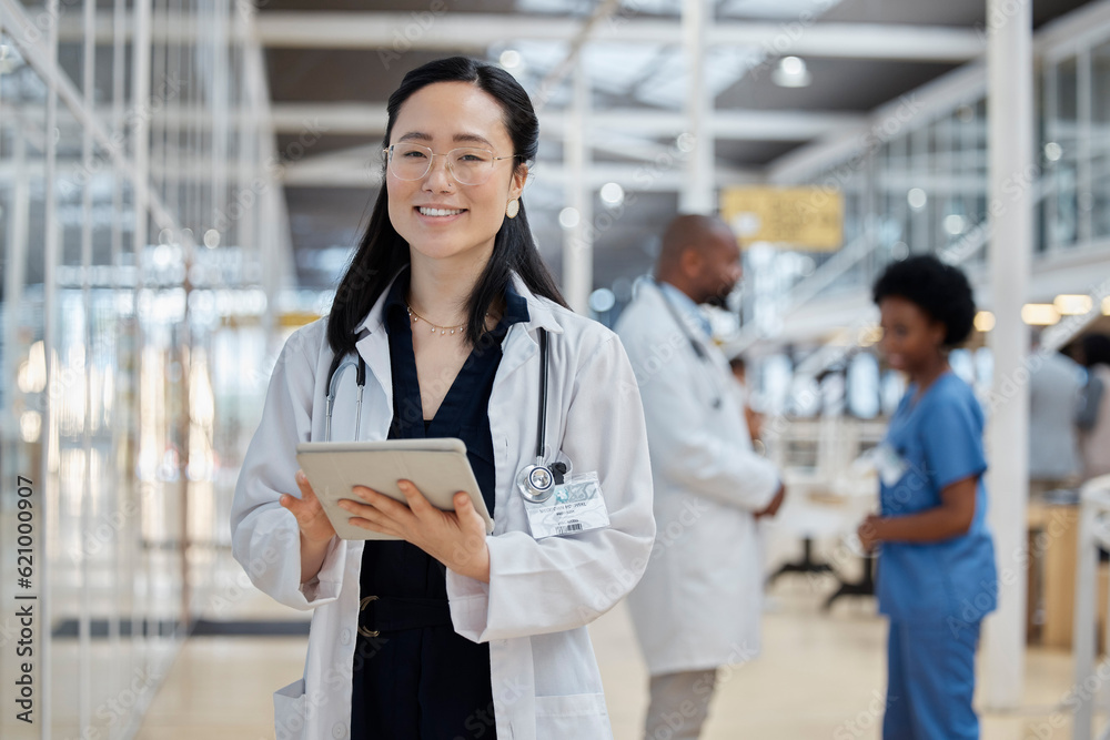 Asian woman, portrait and happy doctor with tablet in hospital for healthcare, telehealth and resear