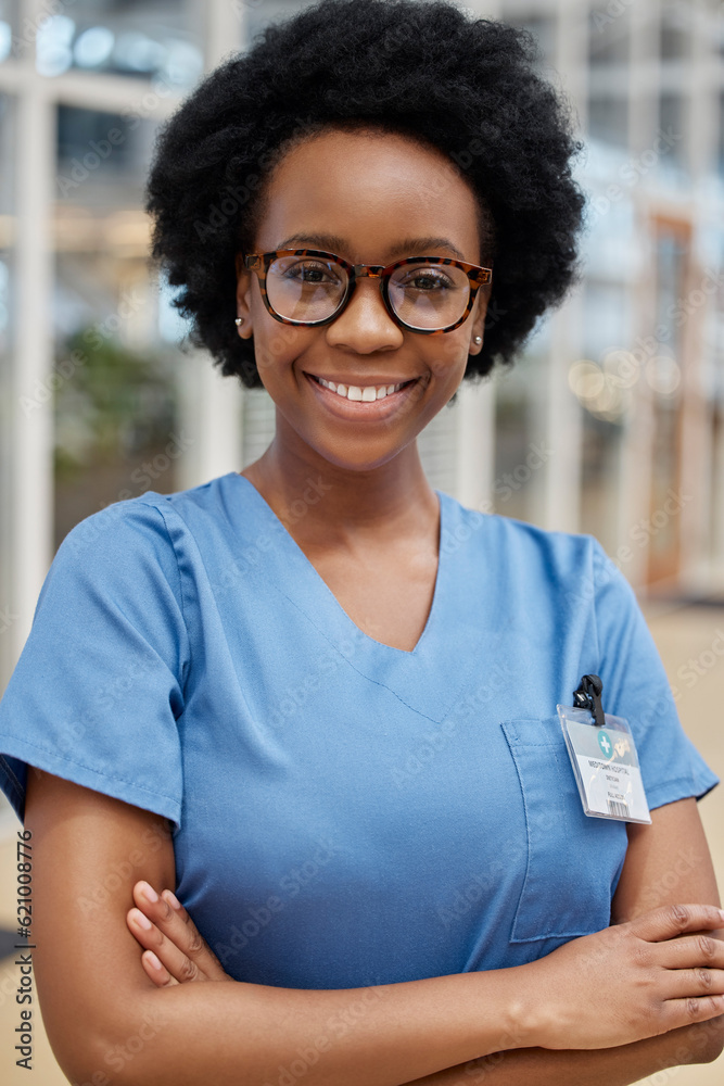 Portrait, nurse and black woman with arms crossed, smile or happy in hospital. African medical profe