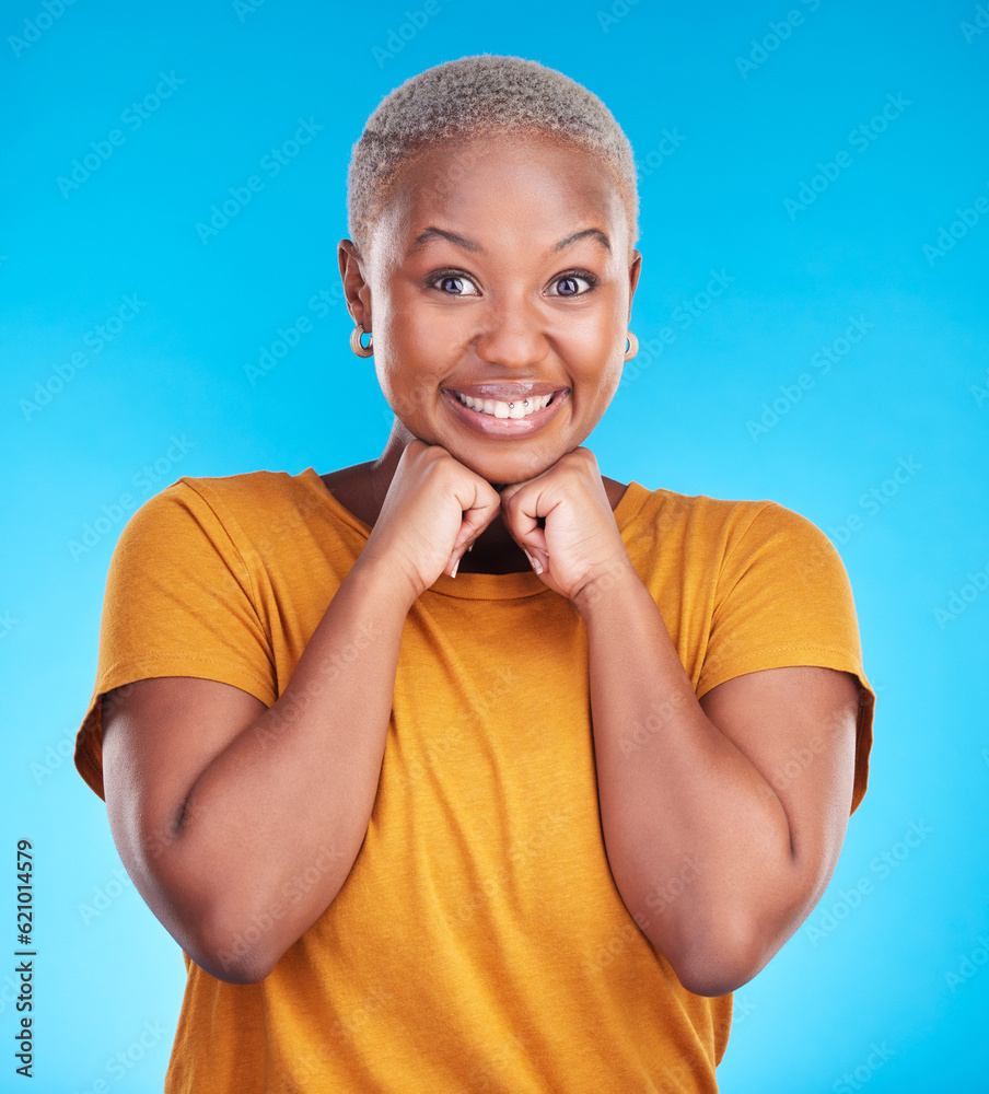 Portrait, smile and black woman with hand on face with confidence in blue studio background. Beauty,