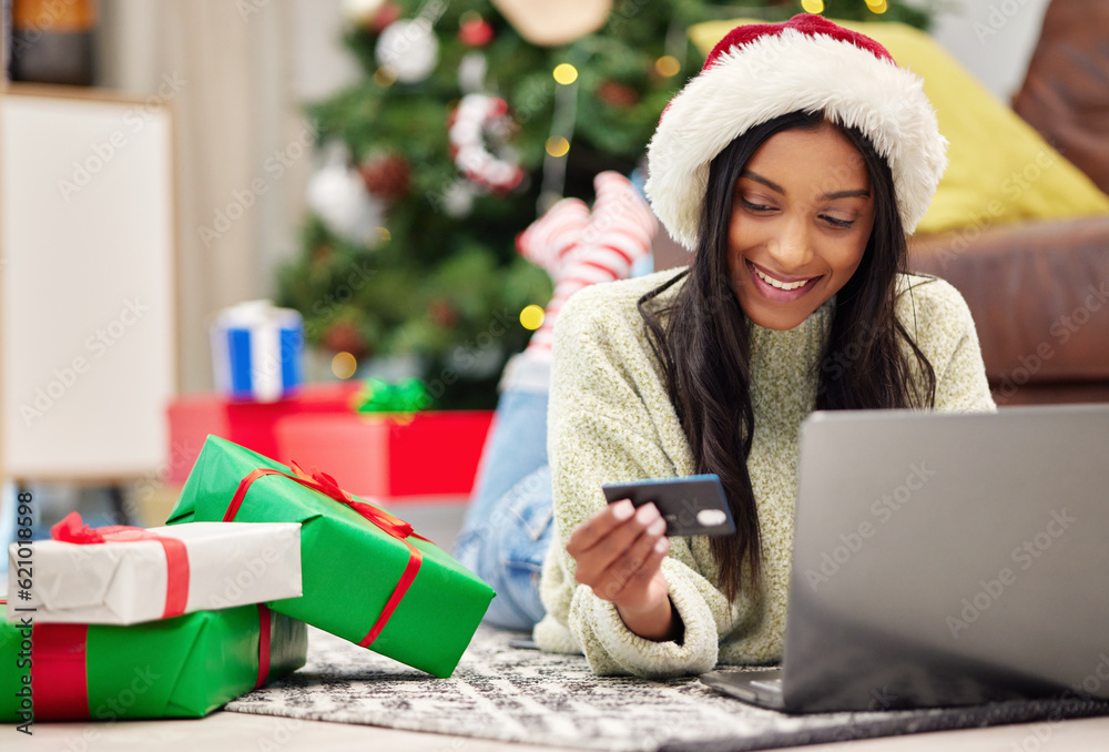 Christmas, e commerce and woman with laptop, credit card for online payment for gift with internet b