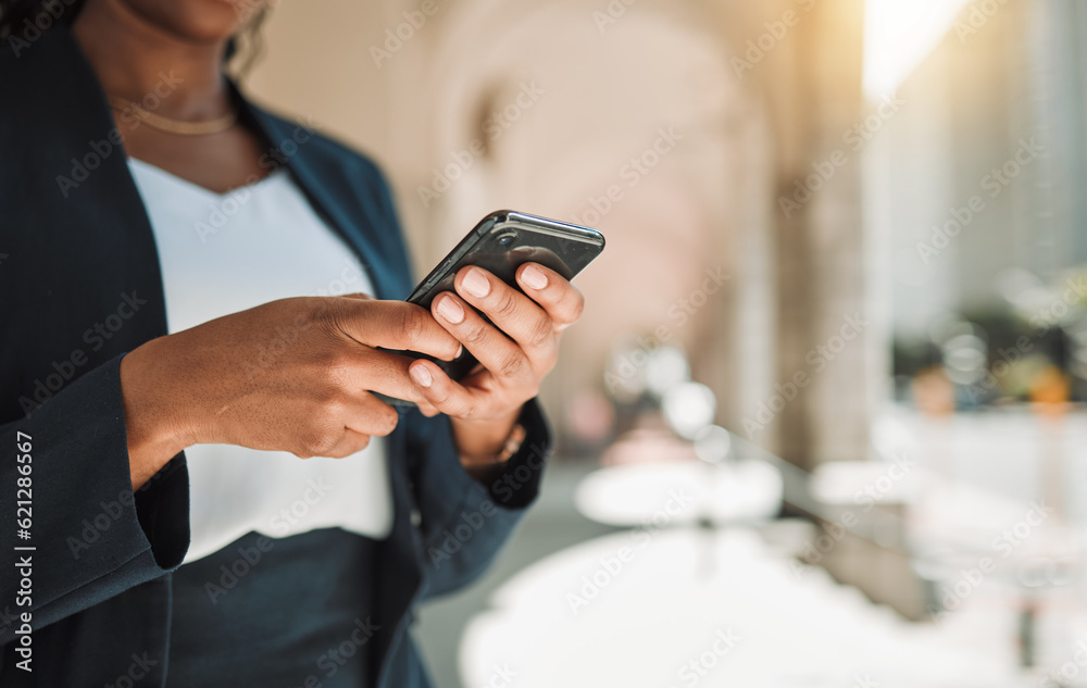 Woman, hands and phone in city for social media, communication or networking outdoors. Closeup of fe