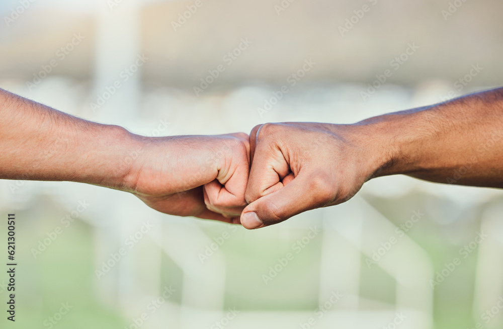 Soccer, fist bump and hands for teamwork, support and sports for training at stadium outdoor. Collab