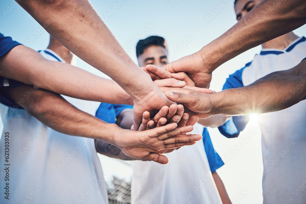 Soccer, hands together and teamwork, support and sports for training at stadium. Collaboration, grou