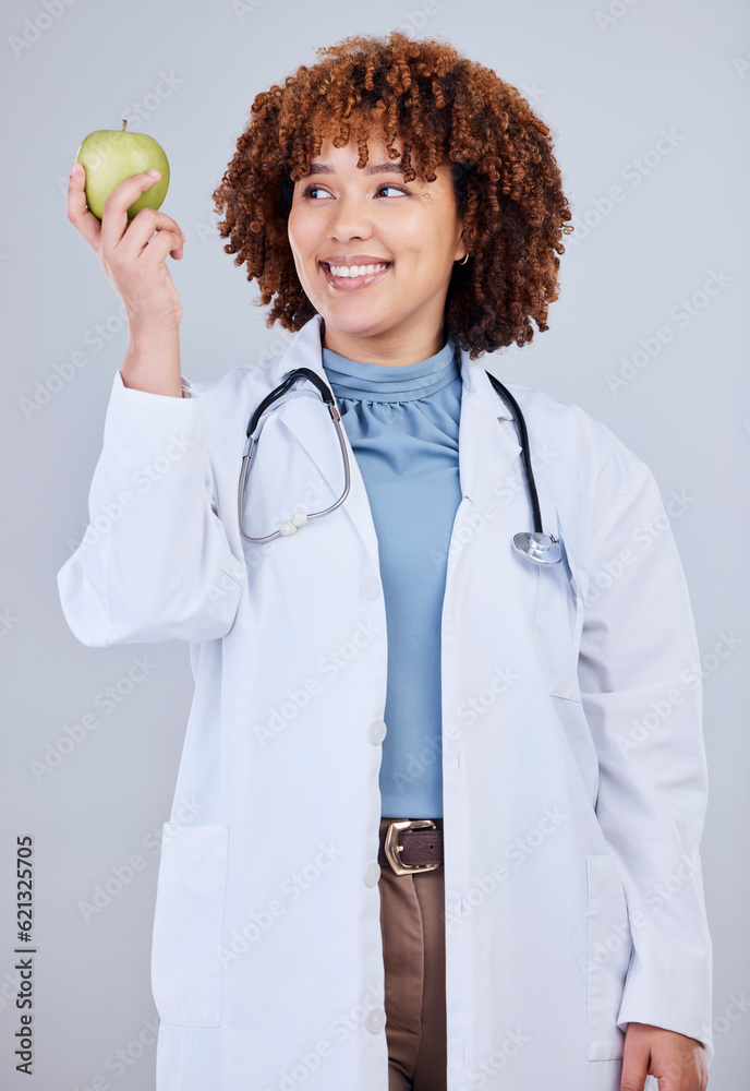 Doctor, woman and smile with apple in white background, studio and vitamin c wellness. Happy female 