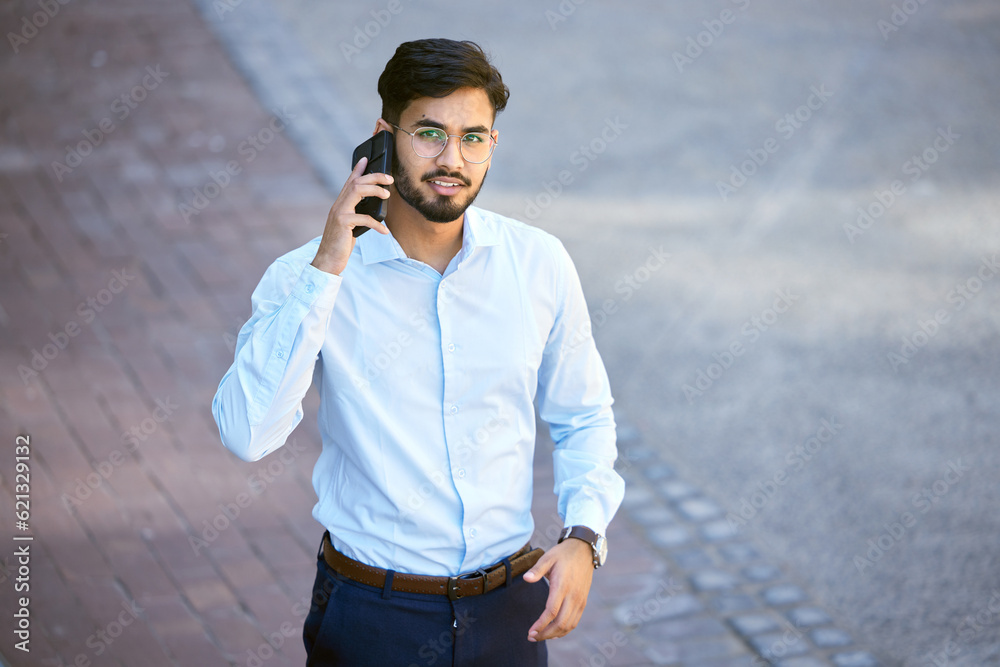 Portrait, indian man and phone call with professional in outdoor for communication with career. Tech