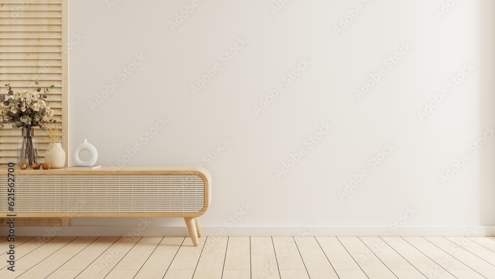 Wall mockup with vase and flower plant,White wall and wooden cabinet.