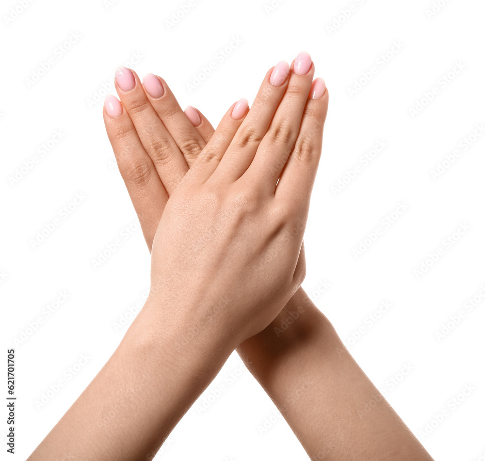 Woman making heart with her hands on white background