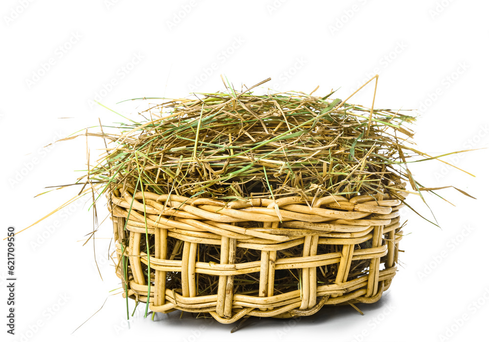 Straw in basket on white background