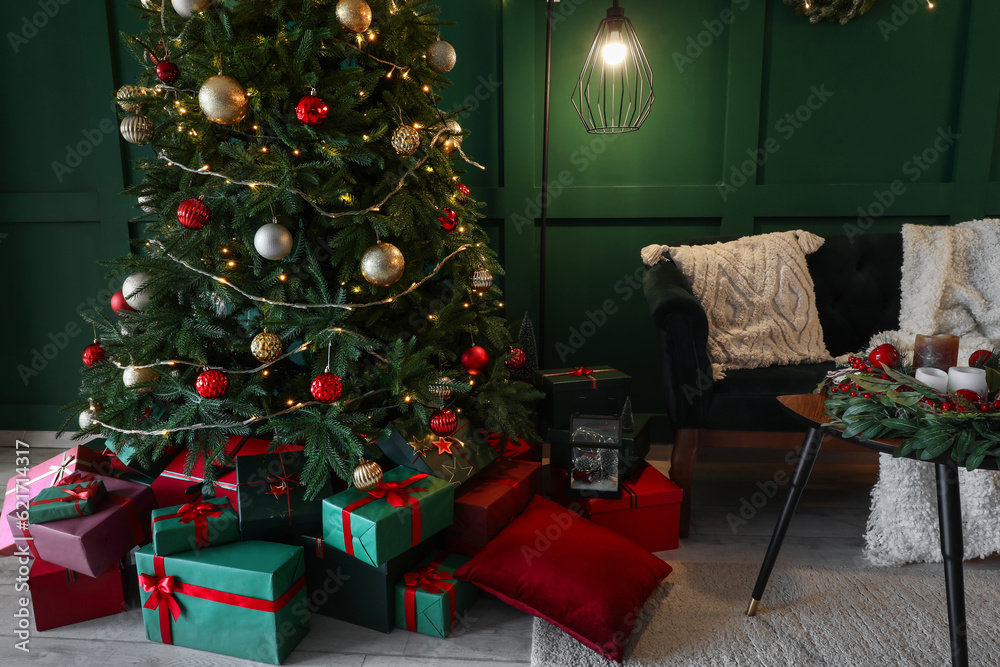 Interior of living room with Christmas tree, gift boxes, sofa and glowing lights