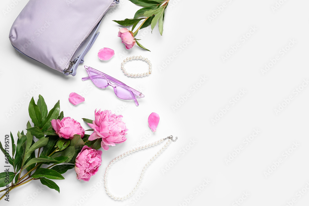 Composition with stylish female accessories and beautiful peony flowers on white background