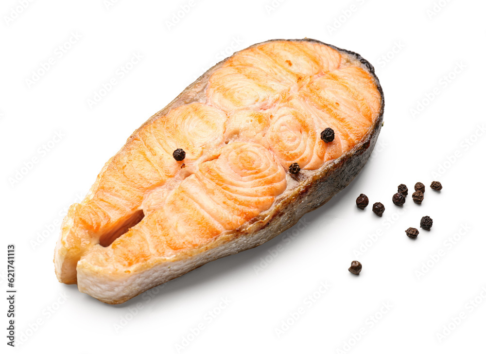 Tasty grilled salmon steak on white background