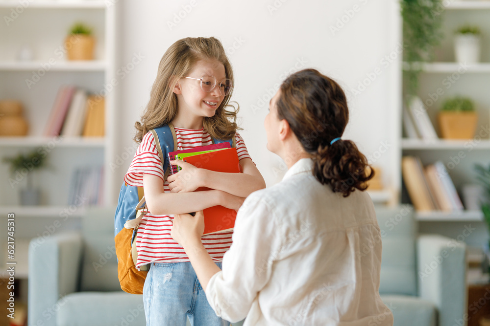 Happy family preparing for school