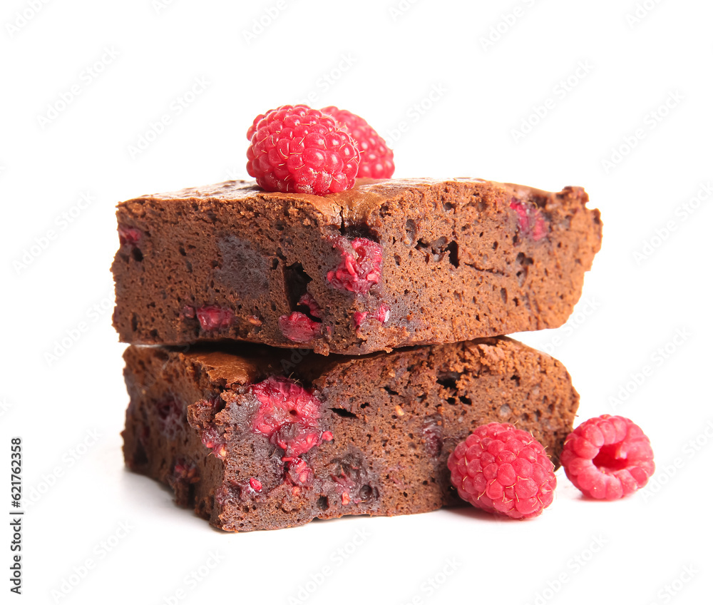 Pieces of raspberry chocolate brownie on white background