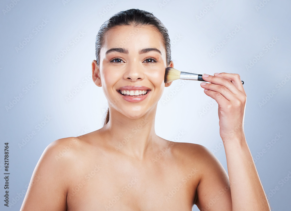 Makeup, portrait and happy woman with brush in studio for cheeks, cosmetics and application on grey 