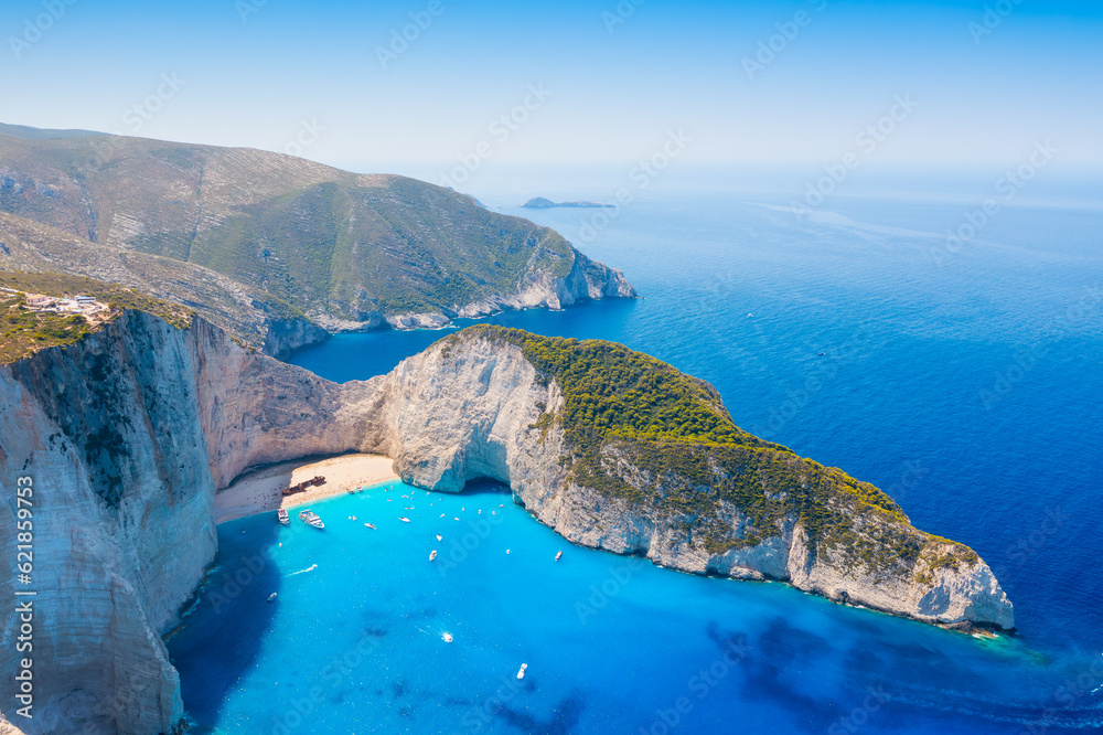 View of Navagio beach, Zakynthos Island, Greece. Aerial landscape. Azure sea water. Rocks and sea. S