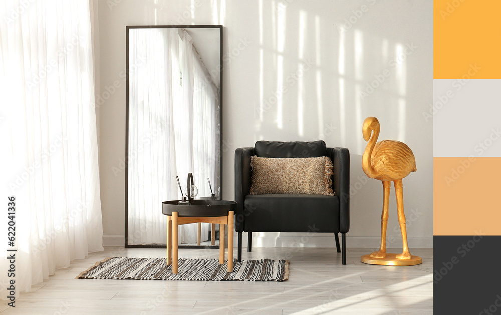 Stylish interior of light room with armchair, table, big mirror and golden flamingo. Different color