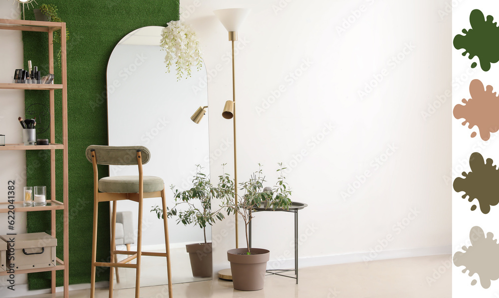 Interior of stylish makeup room with shelving unit, mirror and houseplant. Different color patterns