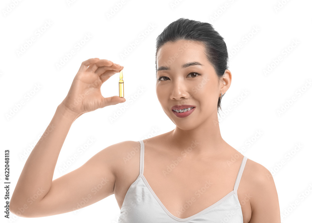 Beautiful Asian woman with ampule on white background. Skin care concept