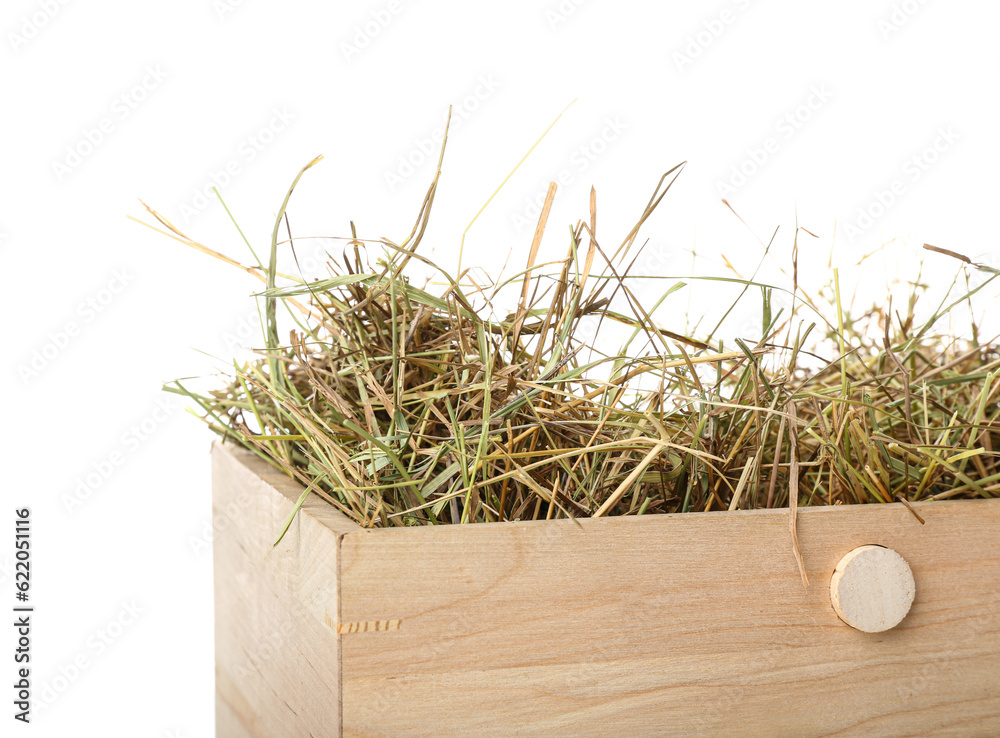 Straw in crate on white background