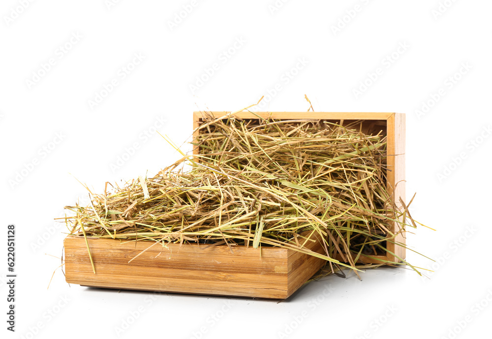 Straw in crates on white background