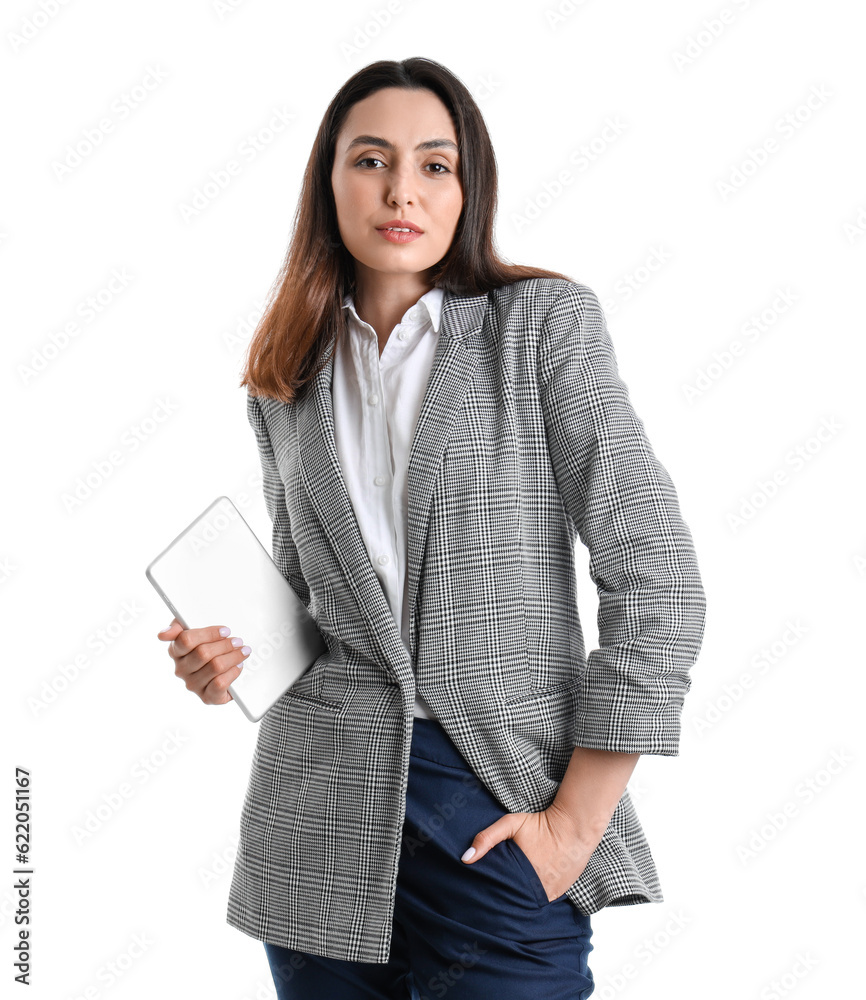 Young woman in stylish suit with tablet computer on white background