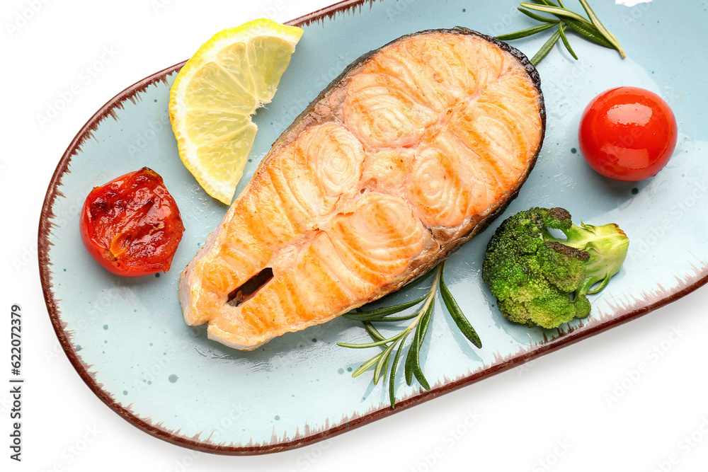 Plate with tasty grilled salmon steak on white background