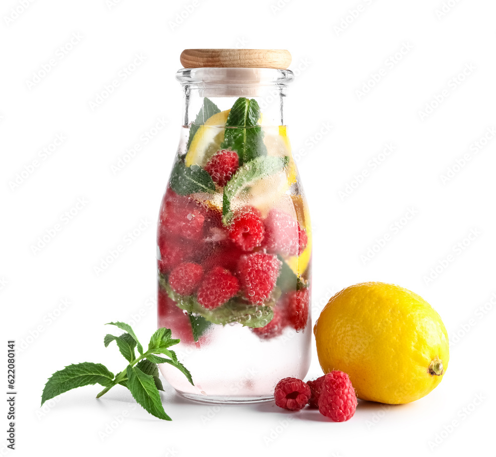 Bottle of fresh raspberry lemonade with mint on white background